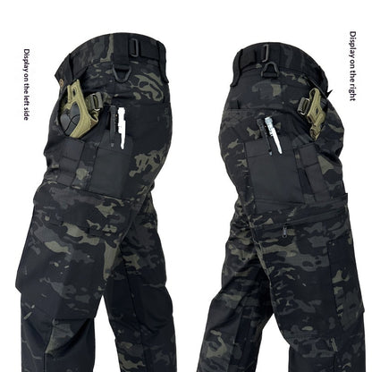 Black camo tactical pants with side pockets holding a knife, pen, and a firearm holster