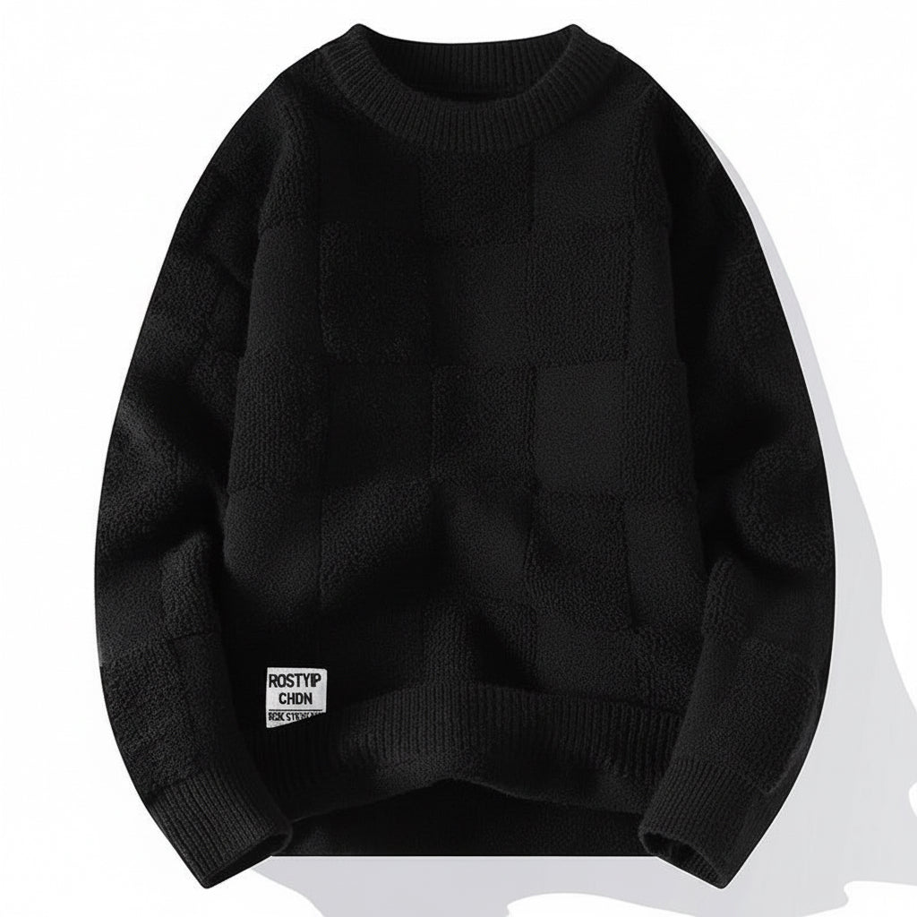 black textured knit crewneck sweater with ribbed cuffs and hem, featuring a small white label