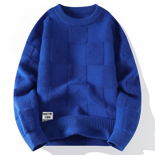 Blue textured knit crewneck sweater with patchwork design and ribbed cuffs