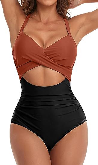 Woman modeling stylish two-tone brown and black cutout one-piece swimsuit
