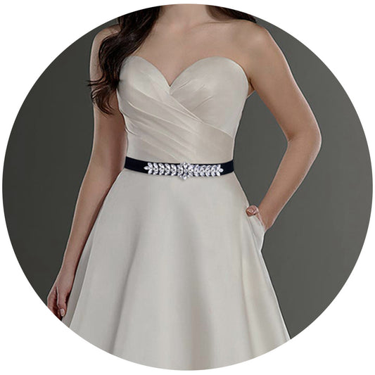 strapless white satin wedding dress with sweetheart neckline and jeweled black belt
