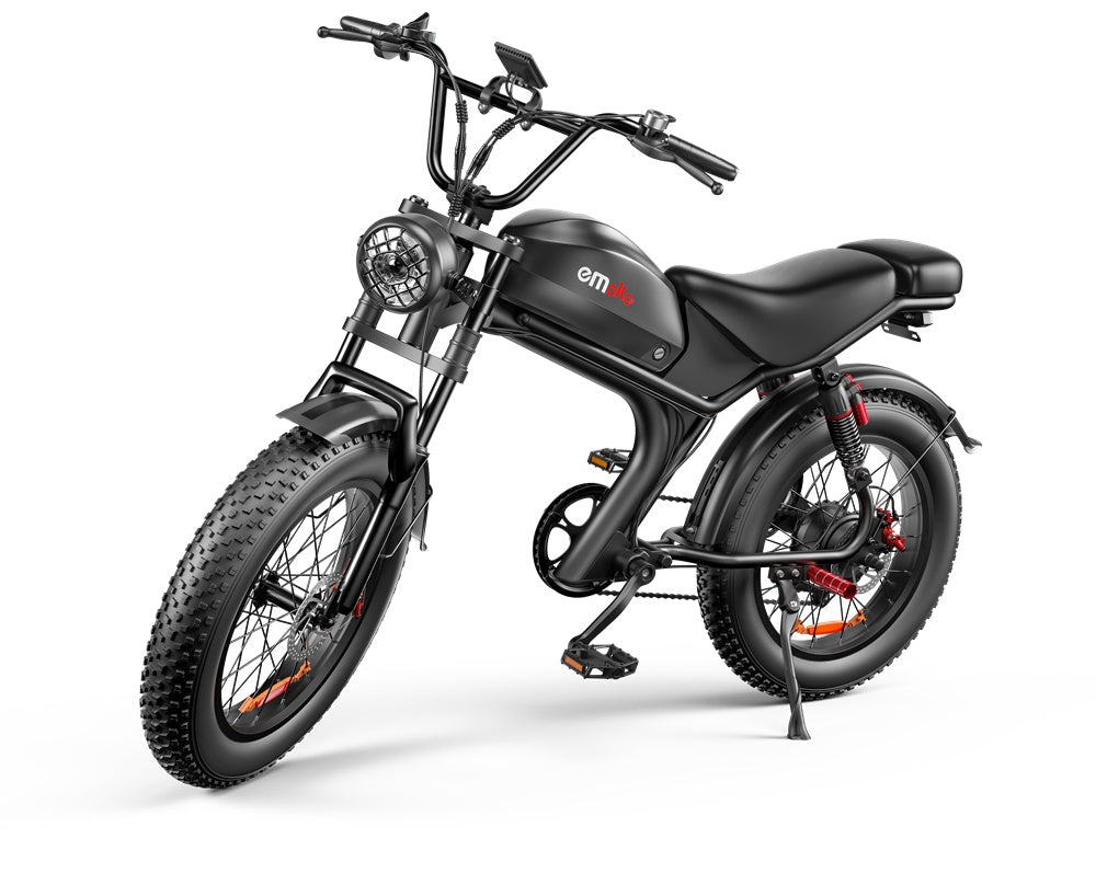 Black Emako electric bike with fat tires, integrated headlight, and sleek modern design on white background