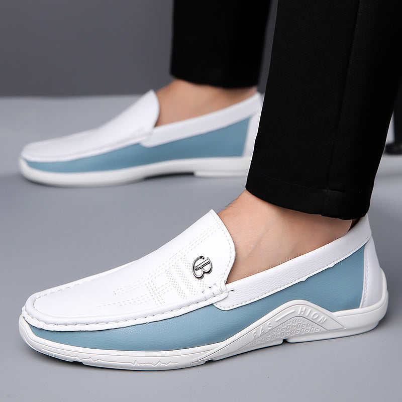 Men's white and blue casual slip-on leather loafers with logo detail and black pants