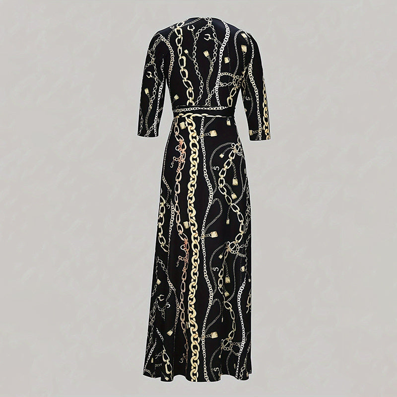 Black maxi dress with 3/4 sleeves featuring gold and silver chain and lock print pattern