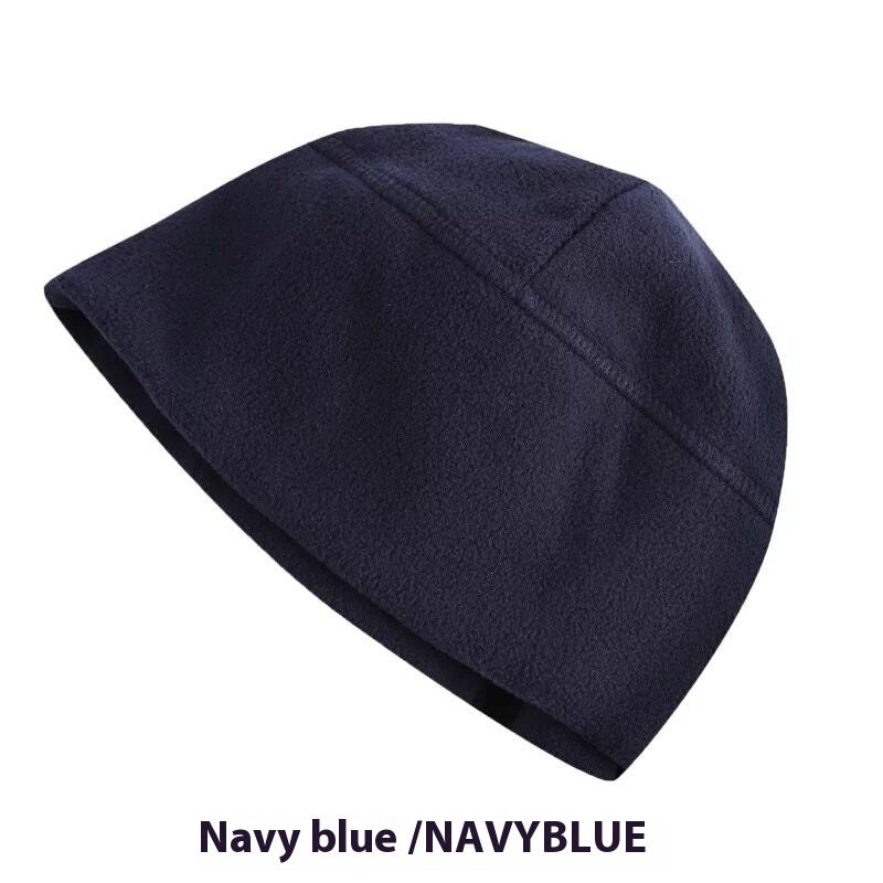 Navy blue fleece bucket hat with visible stitching on white background