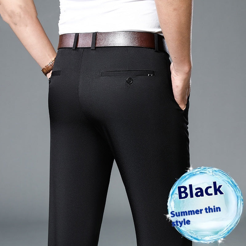 Back view of man wearing black slim-fit summer thin style dress pants with brown belt
