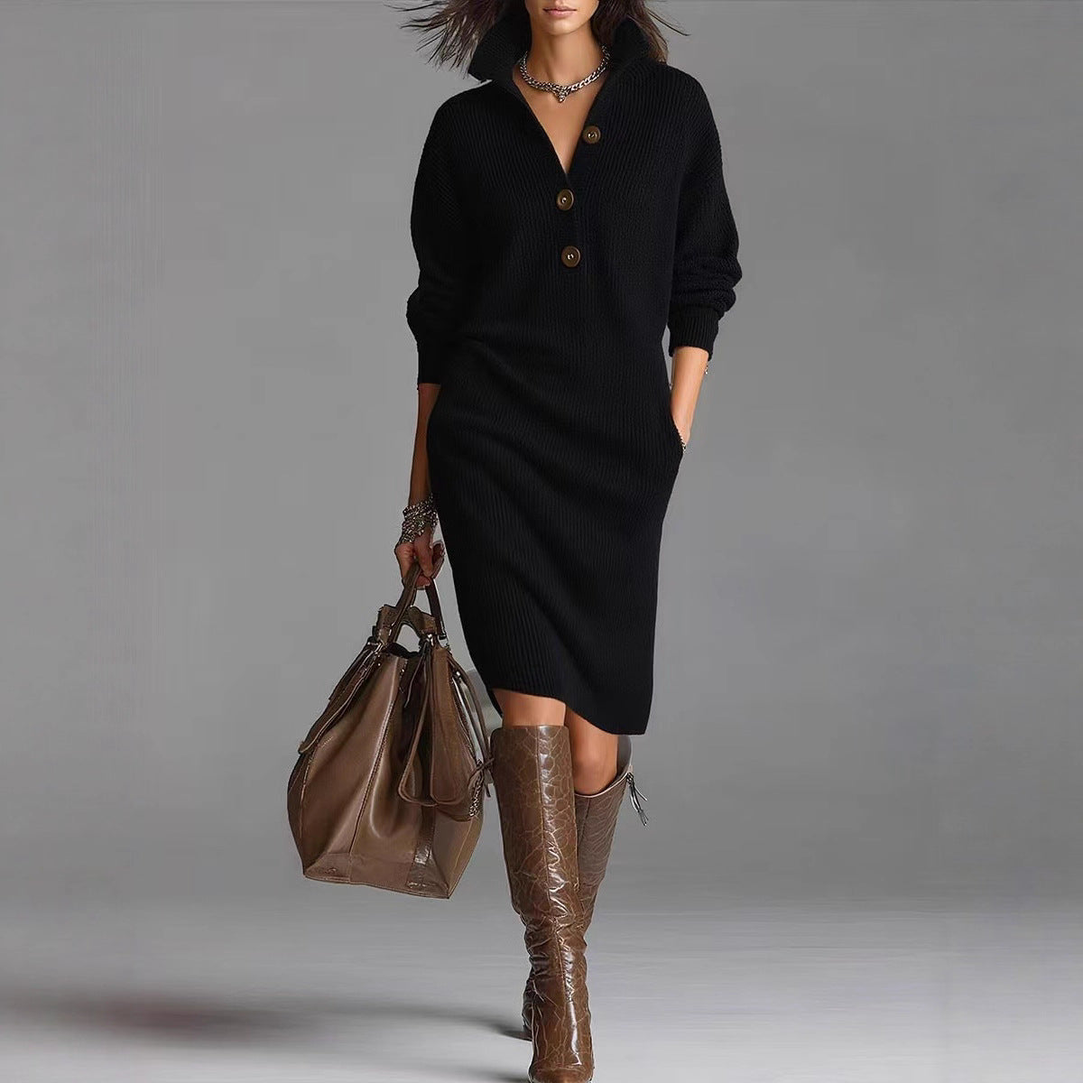 Woman wearing black buttoned knit dress with long sleeves, brown leather knee-high boots, and carrying large brown handbag