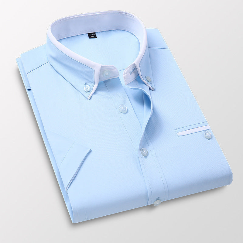 Light blue men's dress shirt with white button-down collar and short sleeves, neatly folded