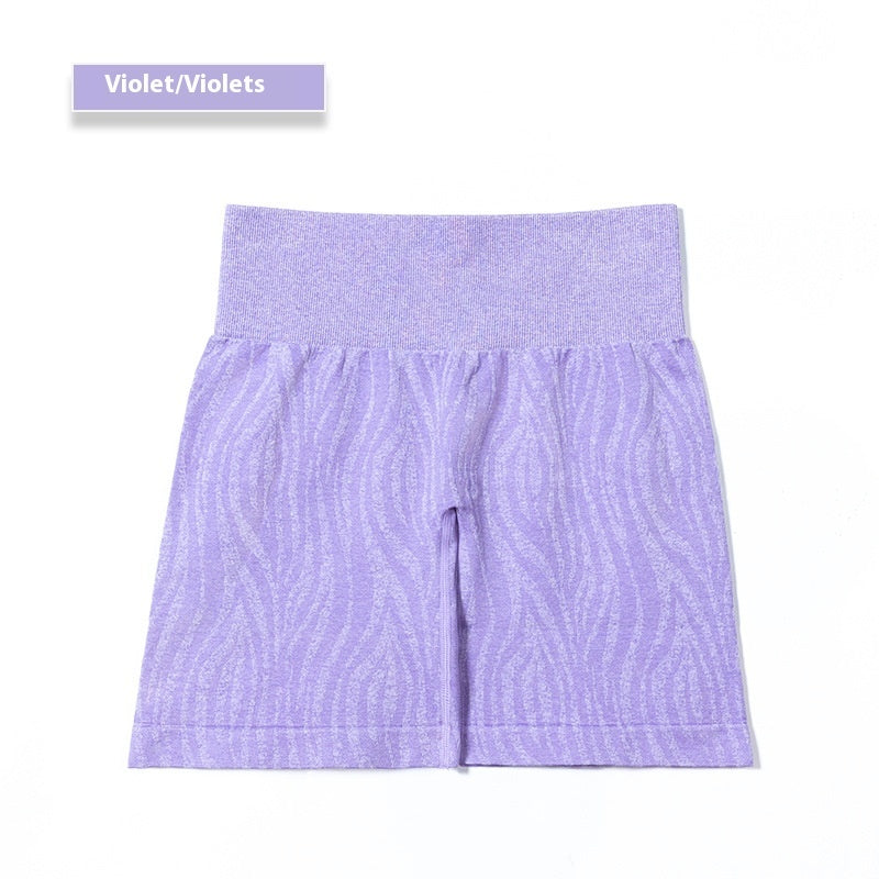 Violet seamless high-waisted women's shorts with subtle wave pattern and wide waistband