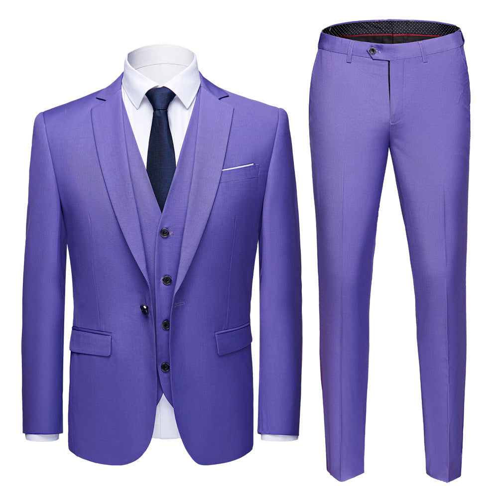 Purple men's three-piece suit with blazer, vest, and pants, paired with white shirt and black tie