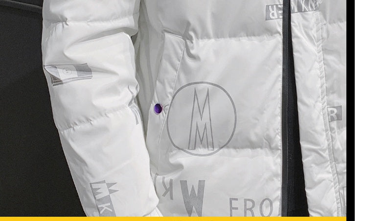 Close-up of white padded winter jacket with printed letters and symbols, purple snap button detail