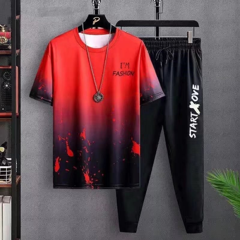 Red and black gradient short-sleeve T-shirt with "I'm Fashion" text and black jogger pants with "Start Love" print