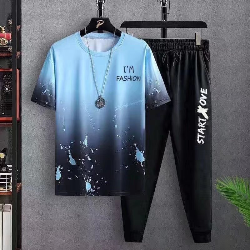 Blue ombre short-sleeve T-shirt with paint splatter and I'm Fashion text, paired with black joggers with Start Love print