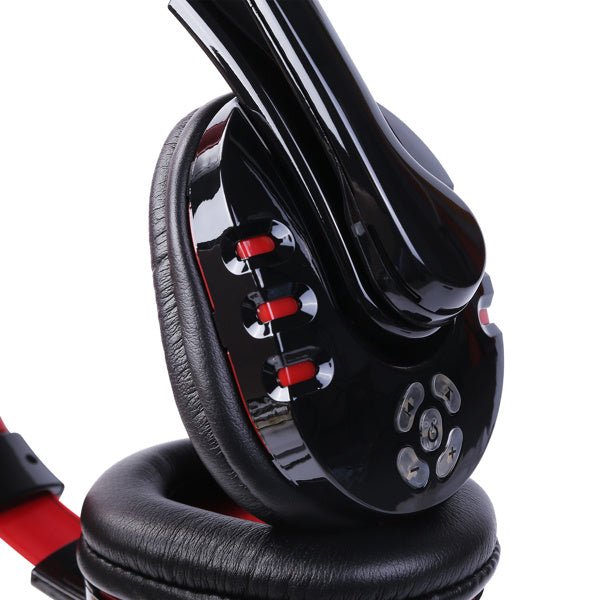 Close-up of black and red wireless Bluetooth noise-cancelling headphones with adjustable ear cups